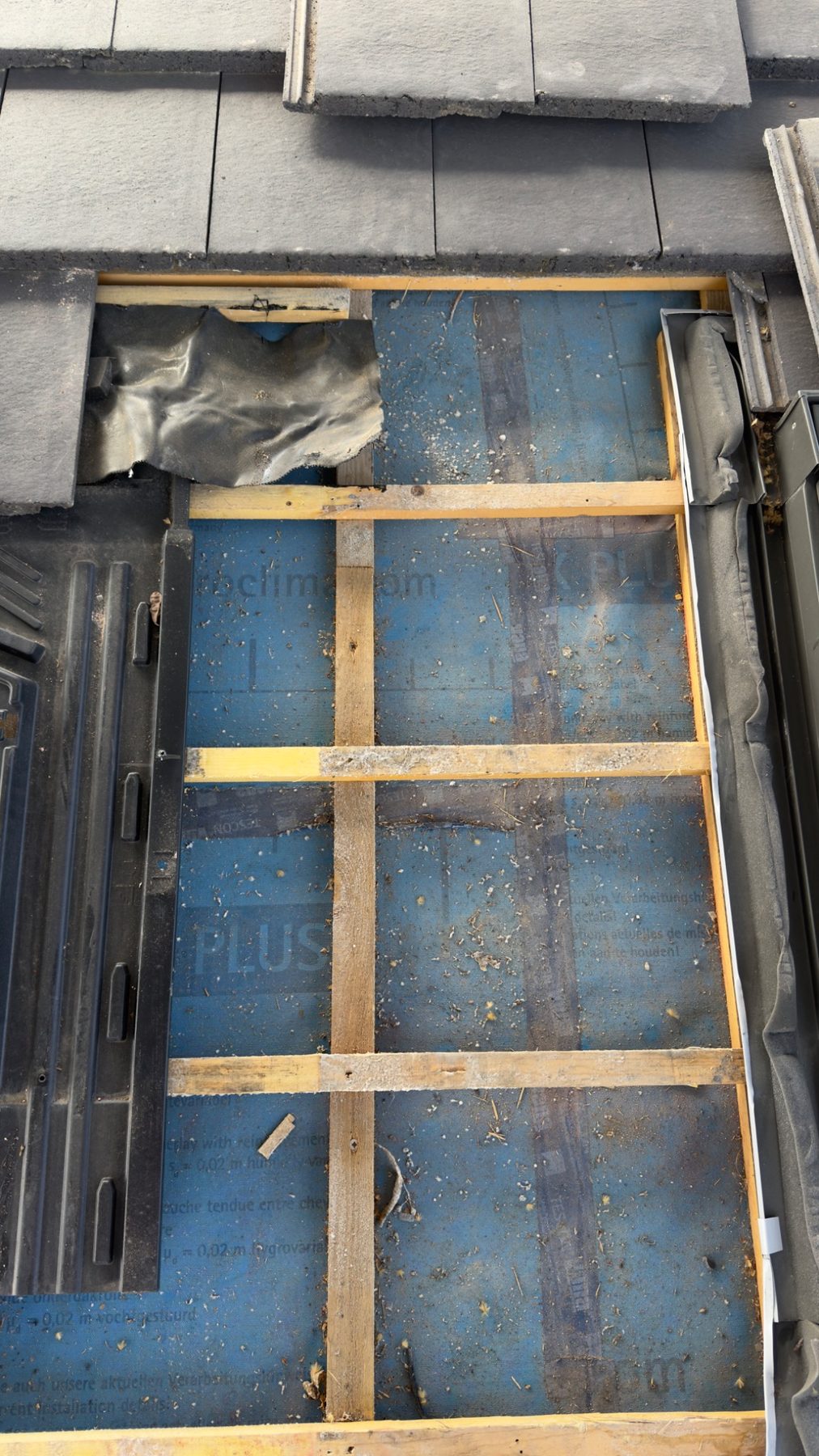 Roof opened locally showing membrane and battens